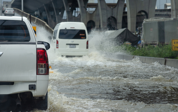 A grooming van in a flooded area